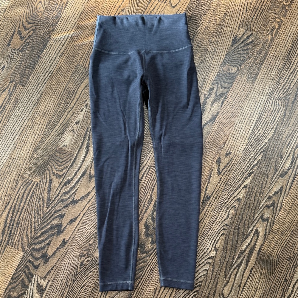 Lululemon Gray Leggings. Size 4. Have light horizontal lines through the grey.